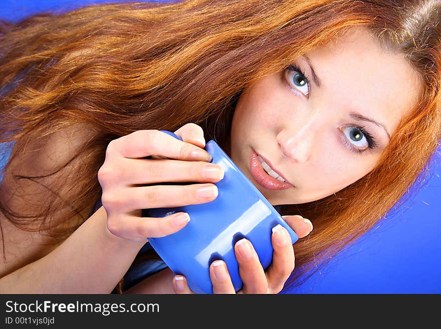 Beautiful girl is drinking tea. Beautiful girl is drinking tea