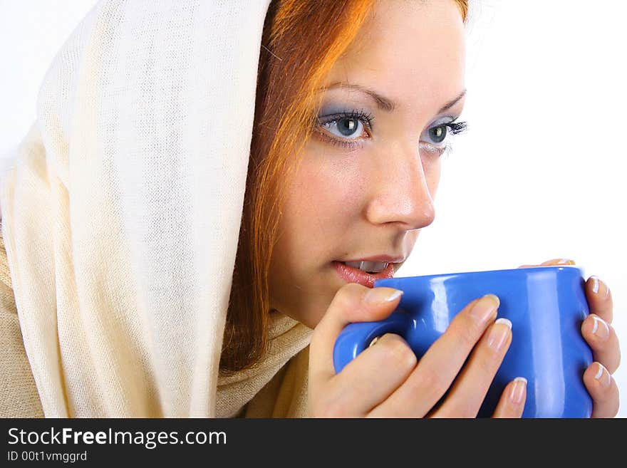 Beautiful girl is drinking tea