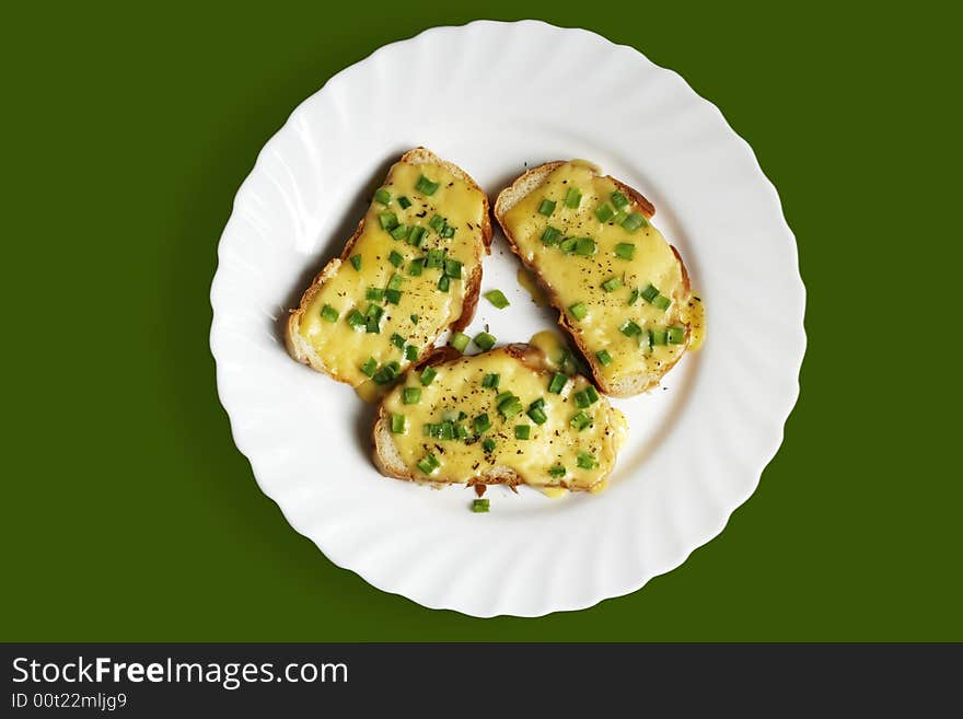 Bread with cheese and onion on isolated plate with path. Bread with cheese and onion on isolated plate with path