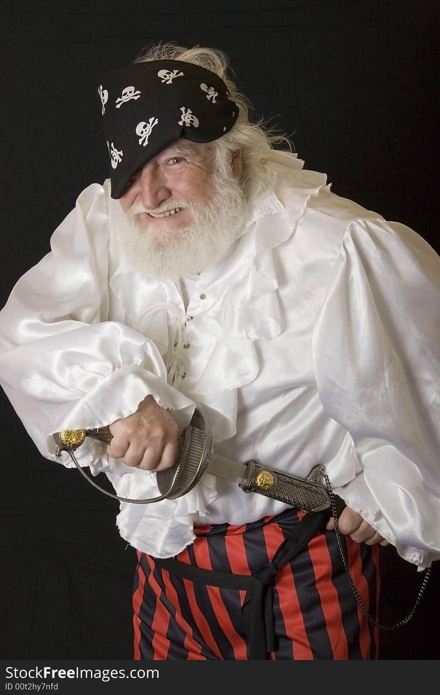 An old man dressed up like a pirate. An old man dressed up like a pirate