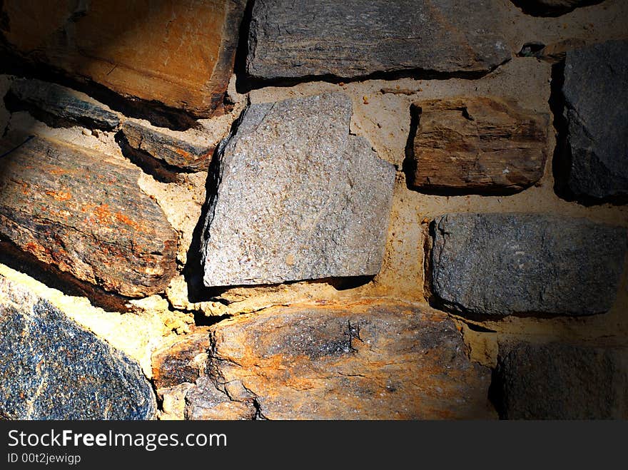 Stone wall with spotlight