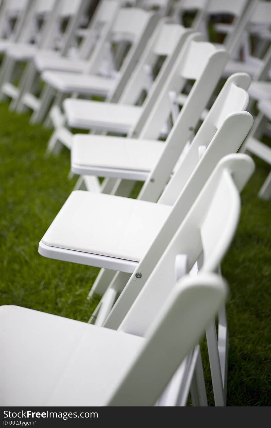 A bunch of chairs in a row