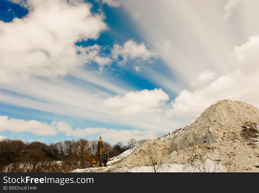 Storing collected snow in local park. Storing collected snow in local park