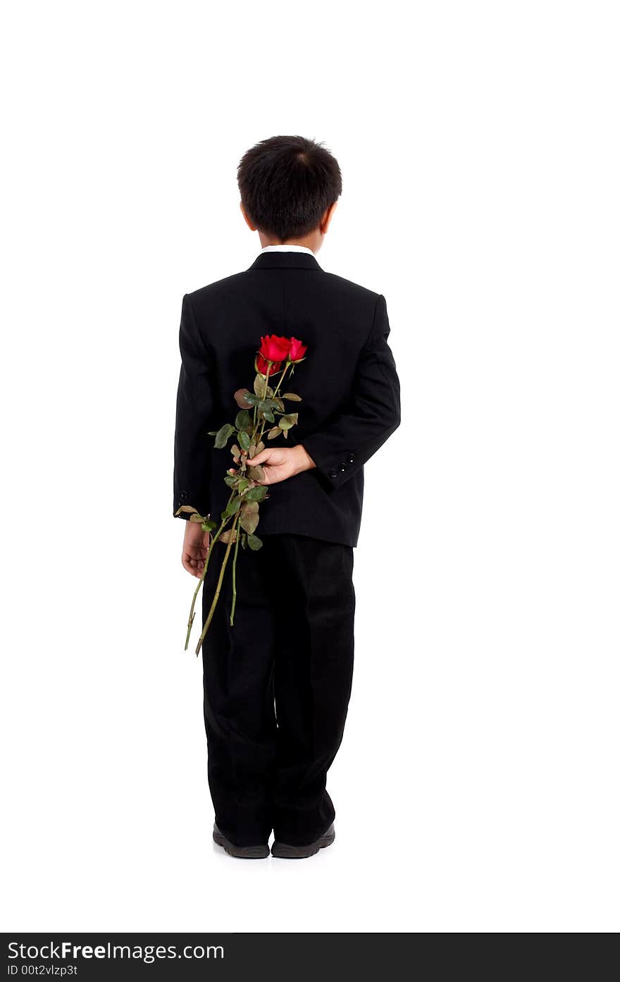 Romantic young man with three red roses