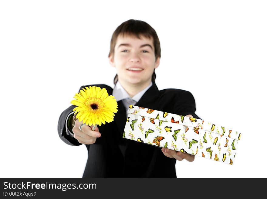 Boy With A Gift On The White Background