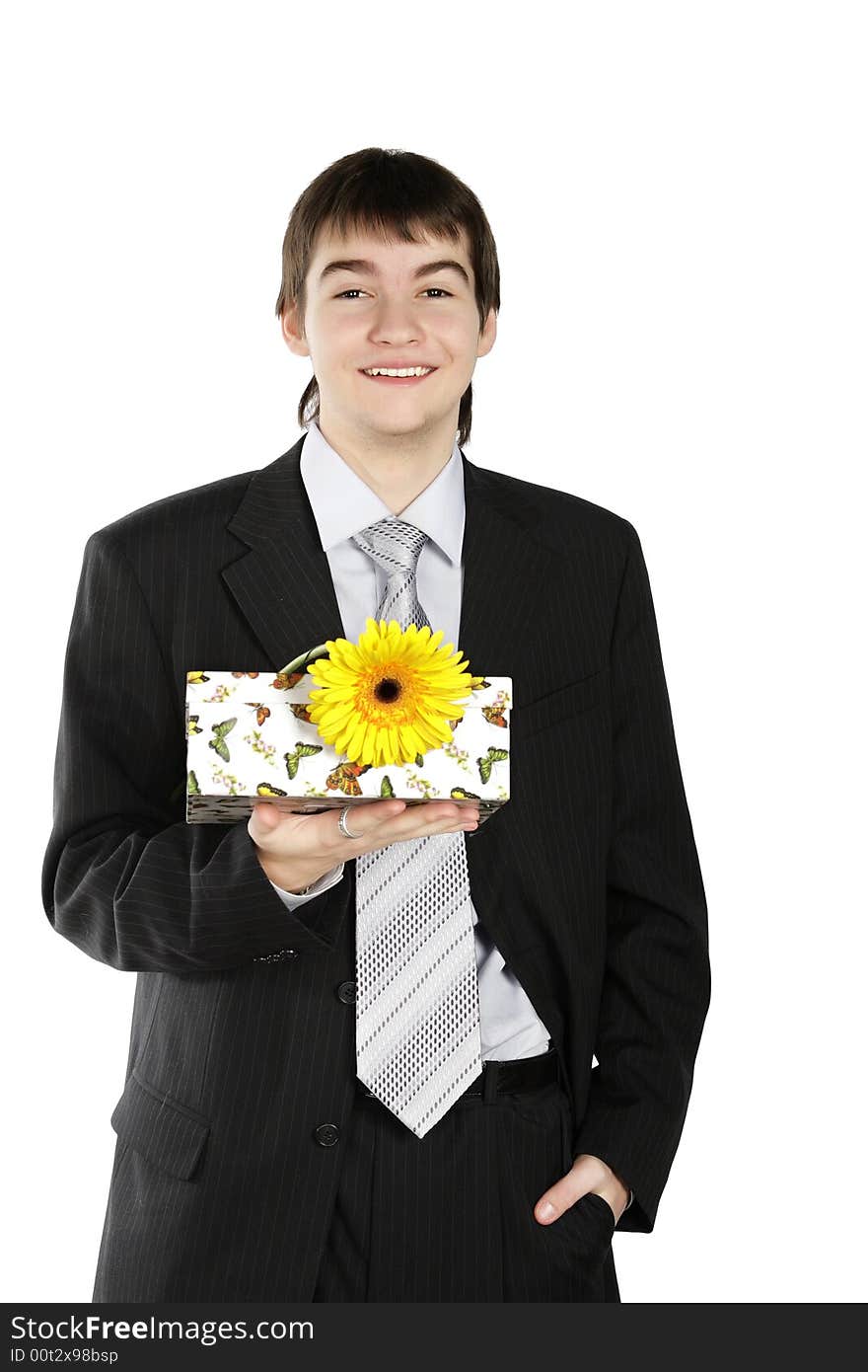 Boy With A Gift On The White Background