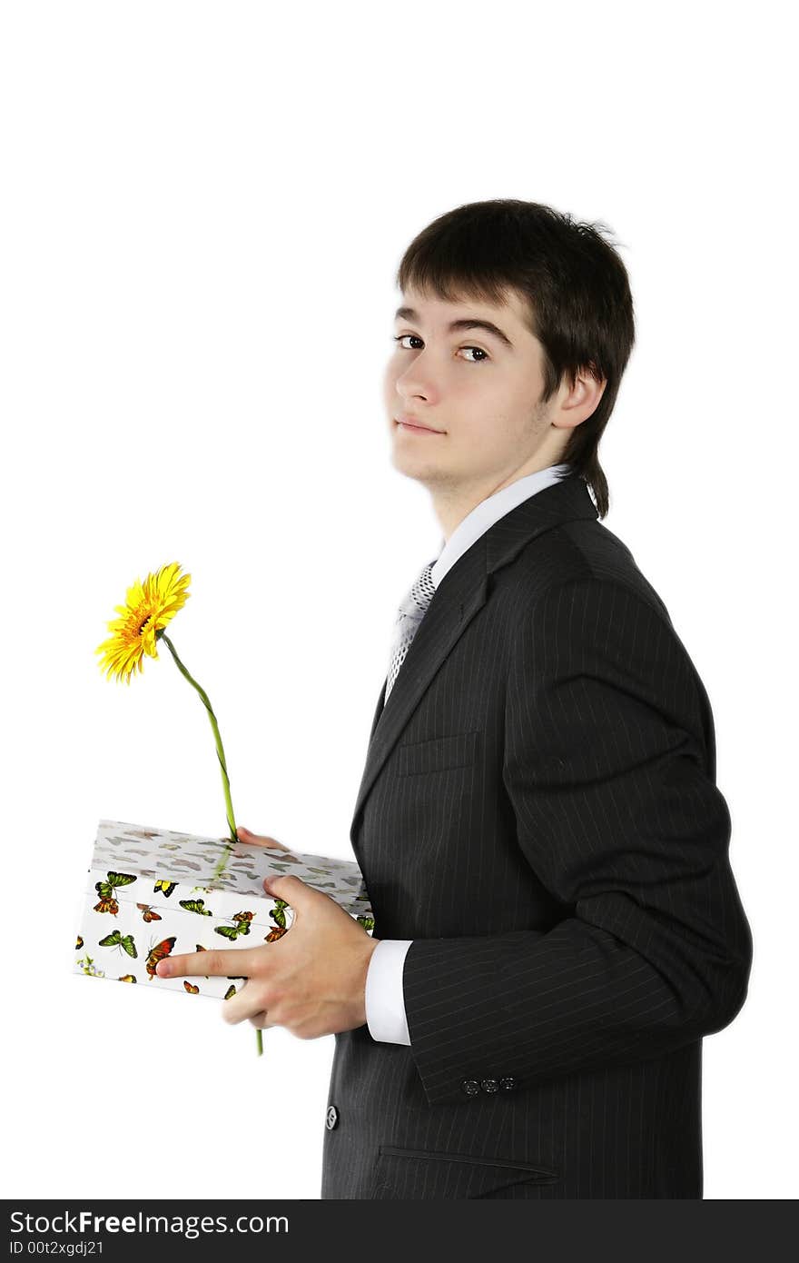 Boy With A Gift On The White Background