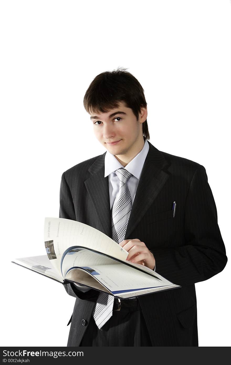 The young student with the book isolated on a white background