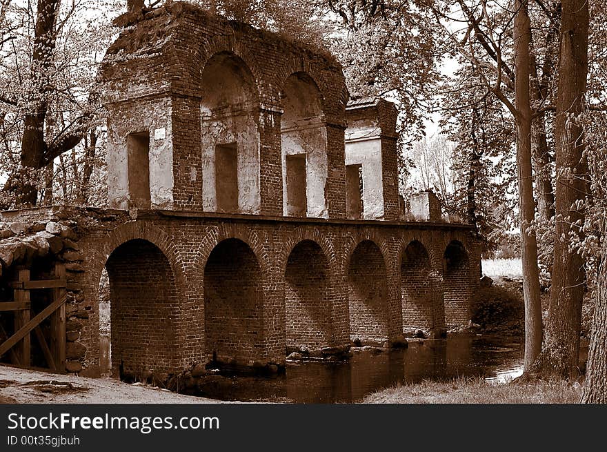 Antique roman aqueduct in sepia