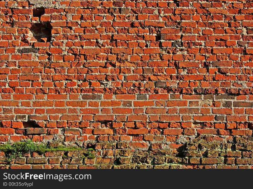 Brick wall with small window