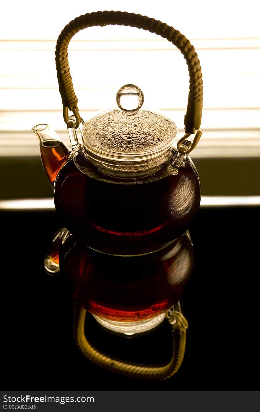 Teapot on the reflected background