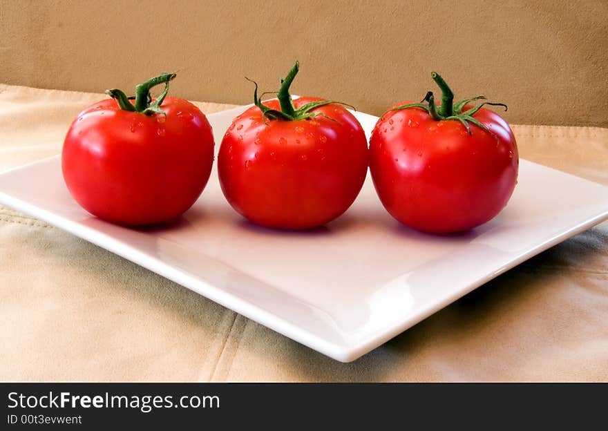 Fresh Vine Ripened Tomatoes on a white plate.
Red Tomatoes hand picked for the grocery market
These will add fresh ingredients to your vegetable list. Fresh Vine Ripened Tomatoes on a white plate.
Red Tomatoes hand picked for the grocery market
These will add fresh ingredients to your vegetable list