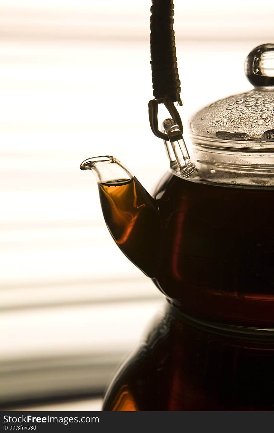 Teapot on the reflected background