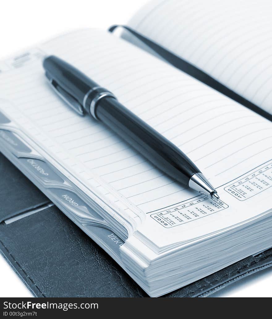 Business notebook on background