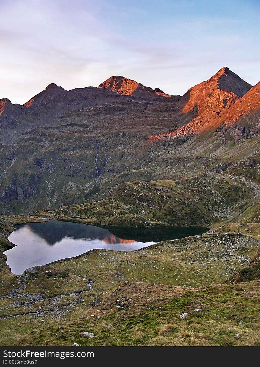 Red Tops With A Dark Lake below