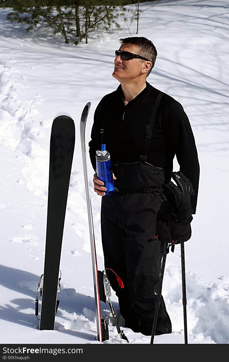 When Spring skiing in the sun, it is important to stay well hydrated. Backcountry telemark skiing, Ontario. When Spring skiing in the sun, it is important to stay well hydrated. Backcountry telemark skiing, Ontario