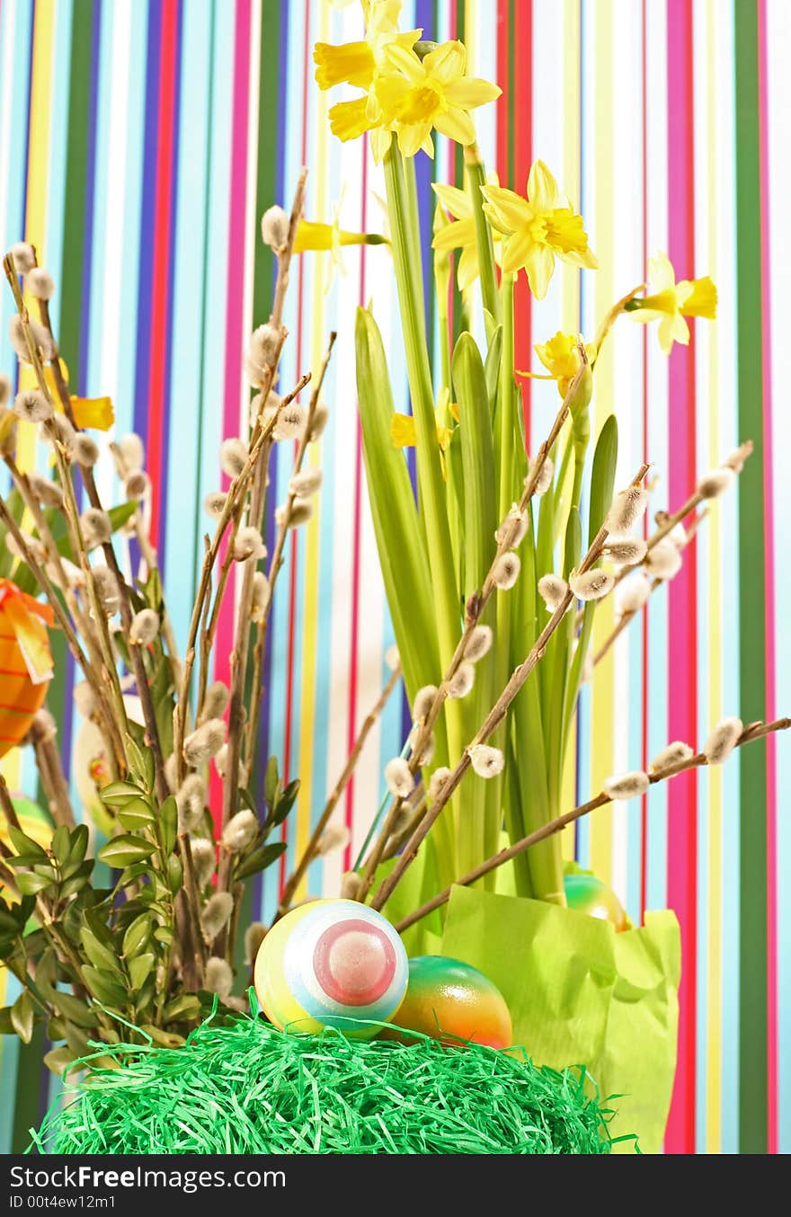 Easter floral arrangement on a coloured background. Easter floral arrangement on a coloured background.