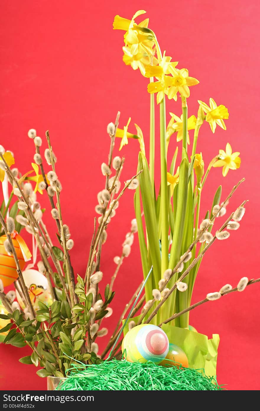 Easter floral arrangement on a red background. Easter floral arrangement on a red background.