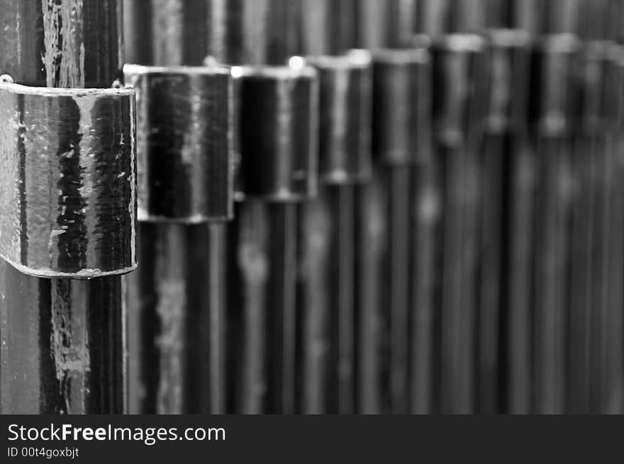 An interesting abstract background formed by a tight row of fence sections. An interesting abstract background formed by a tight row of fence sections