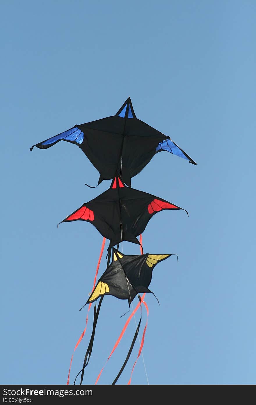 2 batman kites flying in unison