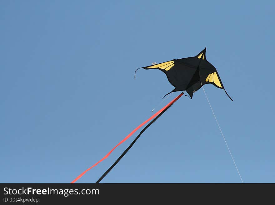 A batman kite flying high