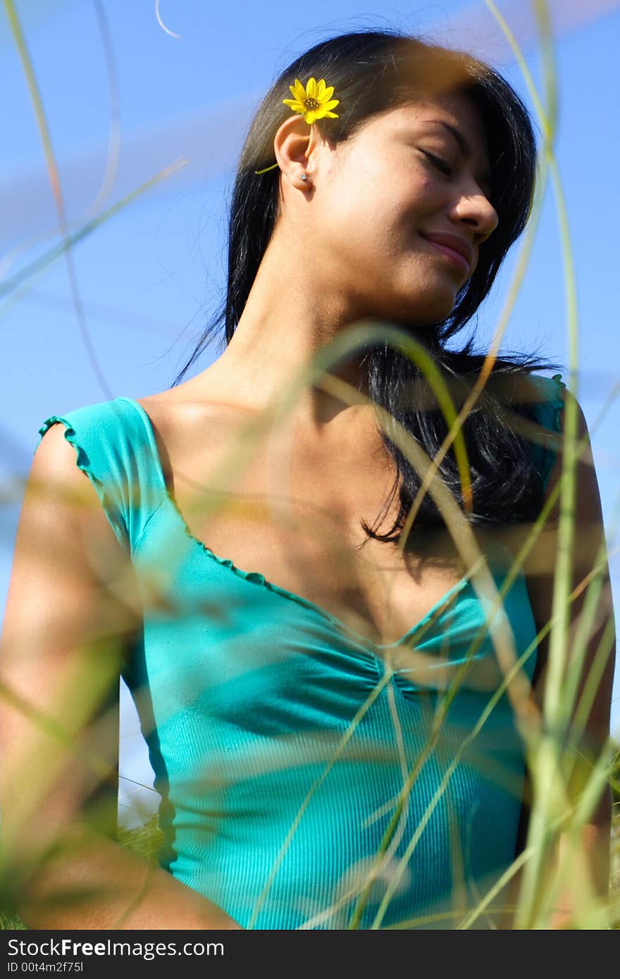 Woman with Grass in Foreground