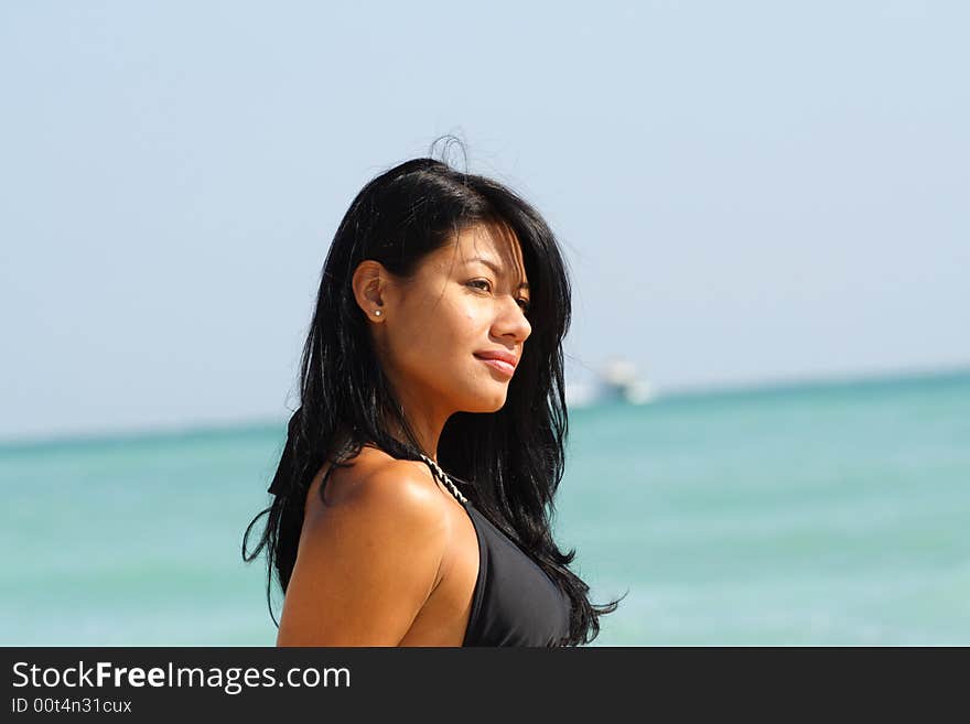 Beautiful young woman on the beach. Beautiful young woman on the beach