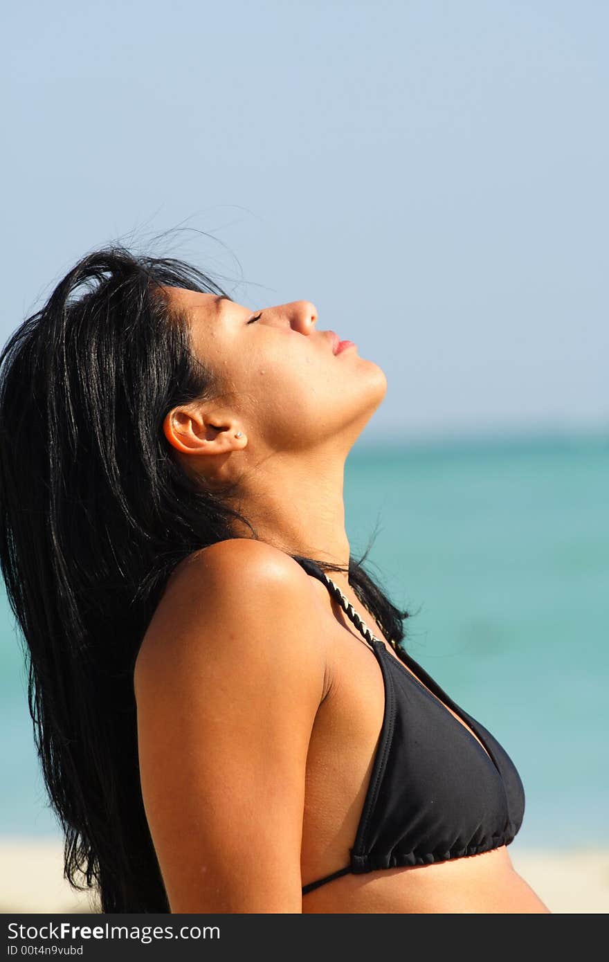 Beautiful Woman On The Beach