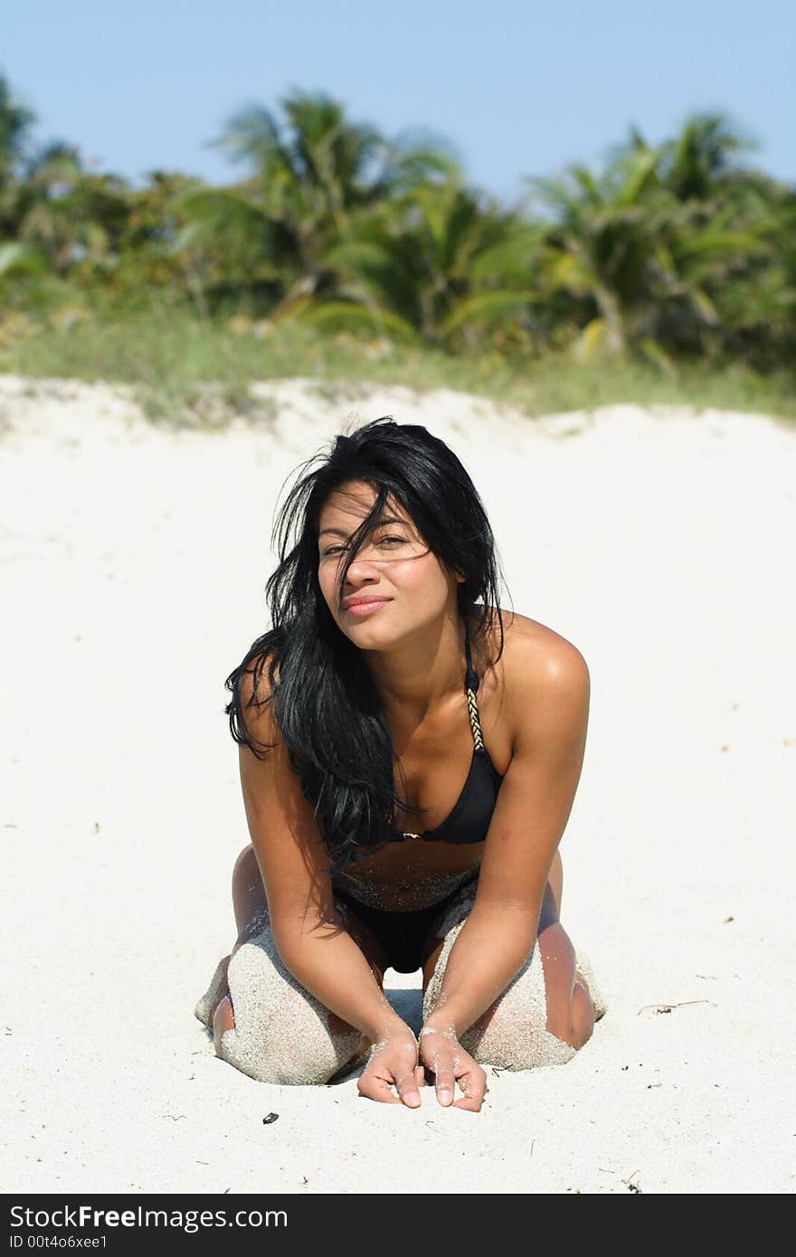 Woman modeling on the beach. Woman modeling on the beach