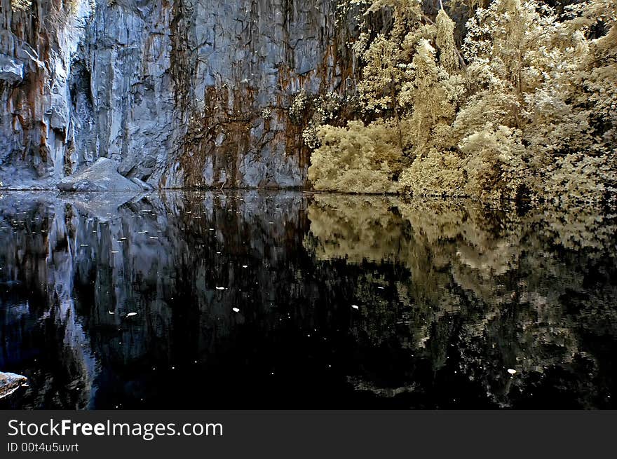 Infrared photo – lake, rock, reflection and tree