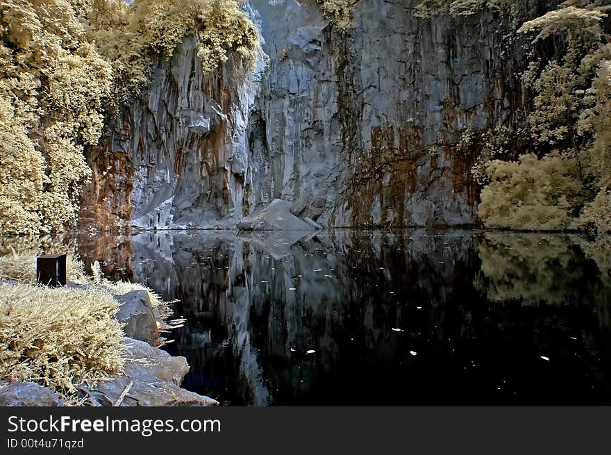 Infrared photo – lake, rock, reflection and tree