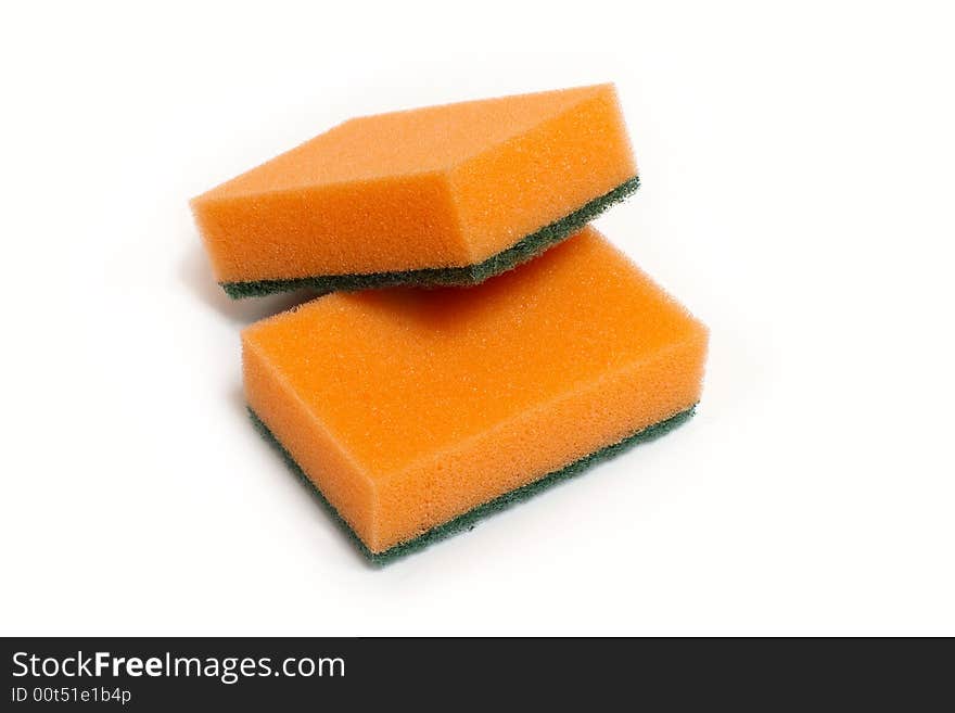 Two orange sponges for washing. Two orange sponges for washing