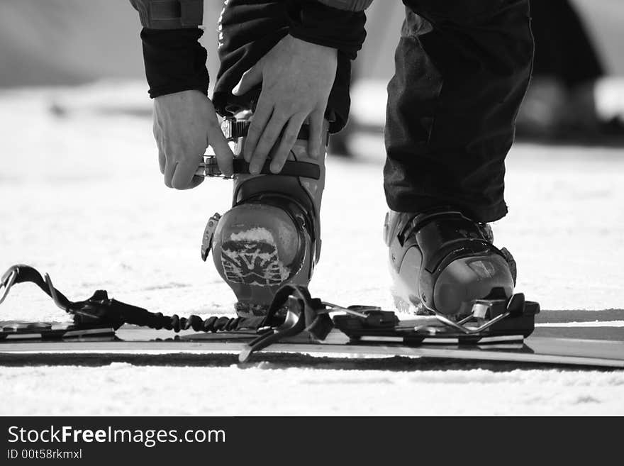 Preparation for snowboarding in the Alpes.