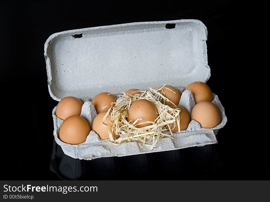 Close up of some Easter eggs in an egg carton