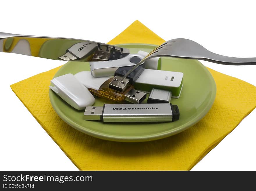 USB flash drive on saucer isolated on white background