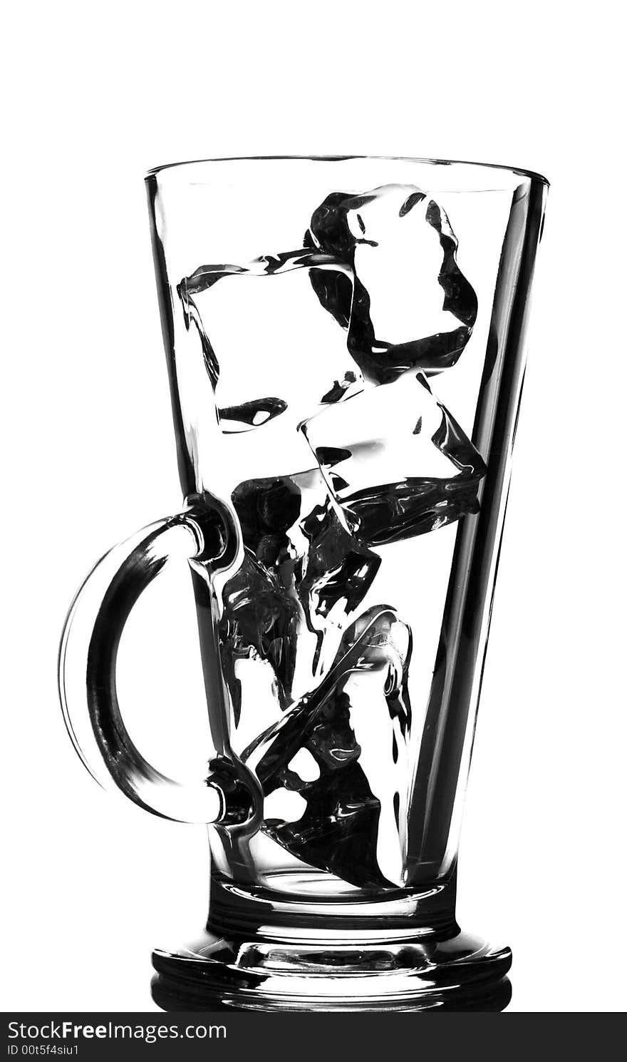 Ice cubes in a tall glass, back light, isolated on white