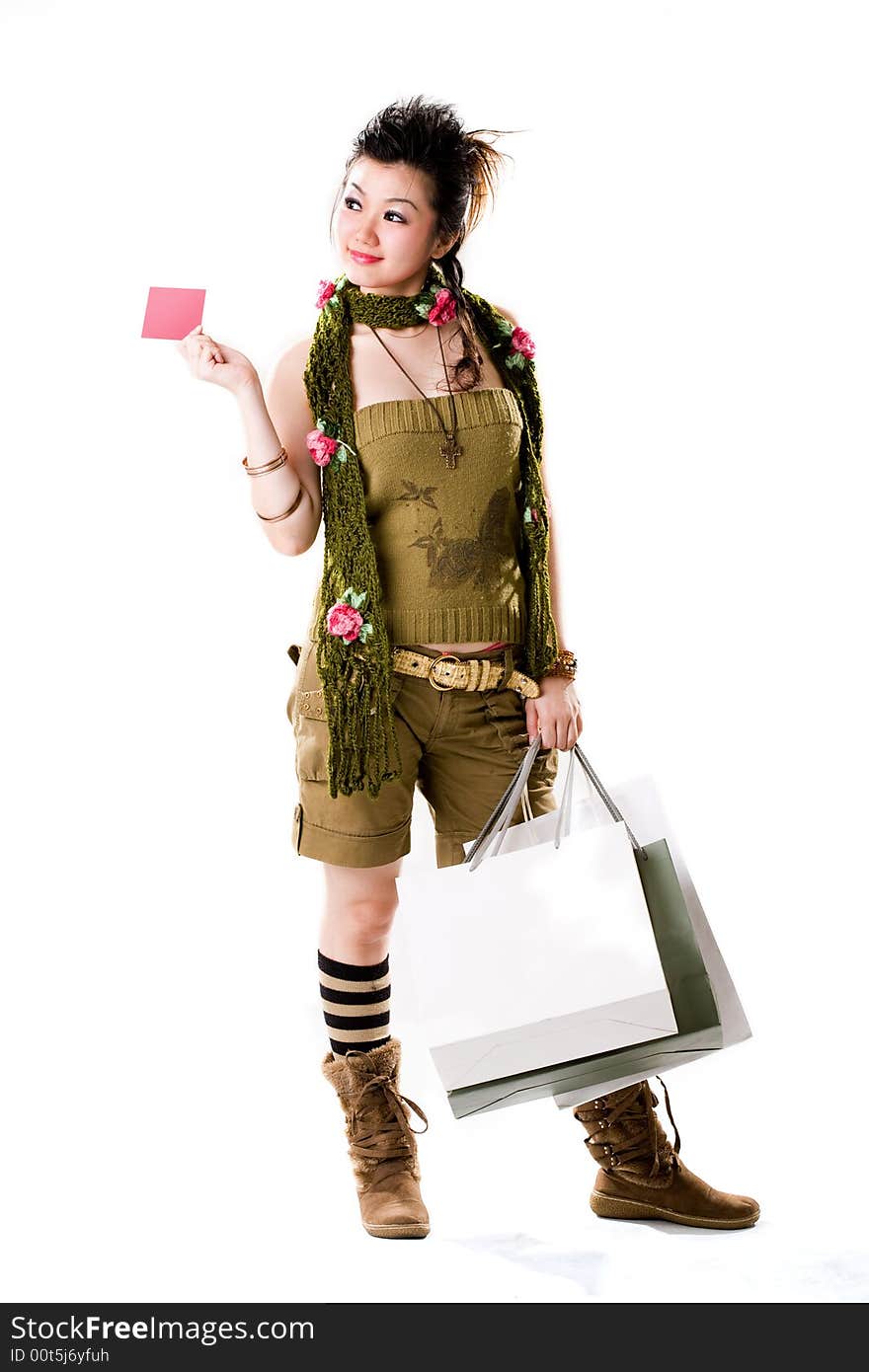 Woman gives business card while shopping. Woman gives business card while shopping