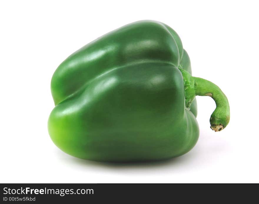 A green pepper isilated against a white background