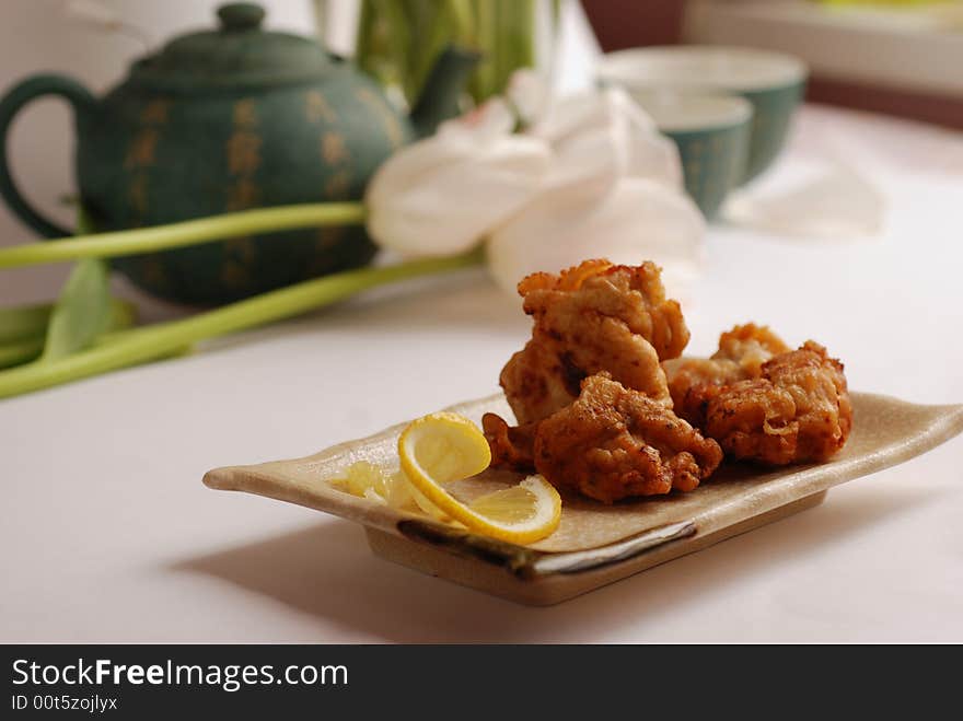 Fried chicken strips on a plate