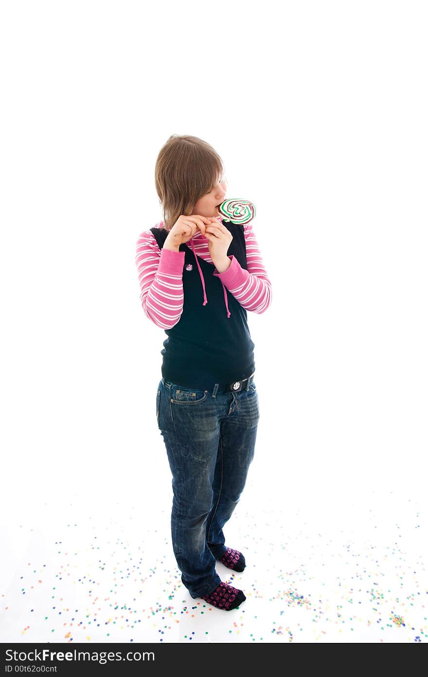 The girl with a sugar candy isolated on a white background