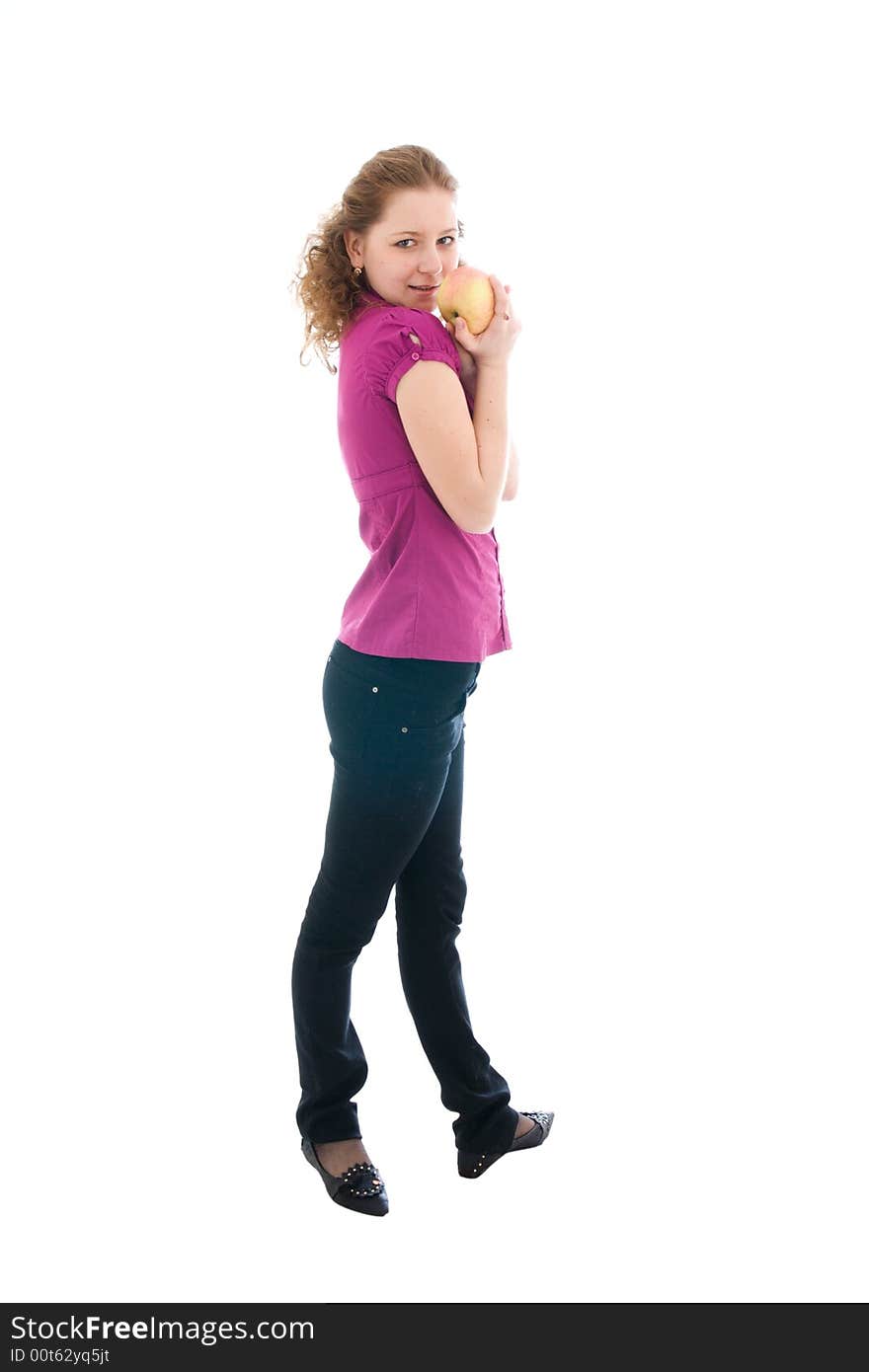 The young beautiful girl with the apple isolated on a white background