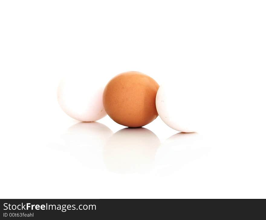 Three eggs isolated on a white background. Three eggs isolated on a white background.