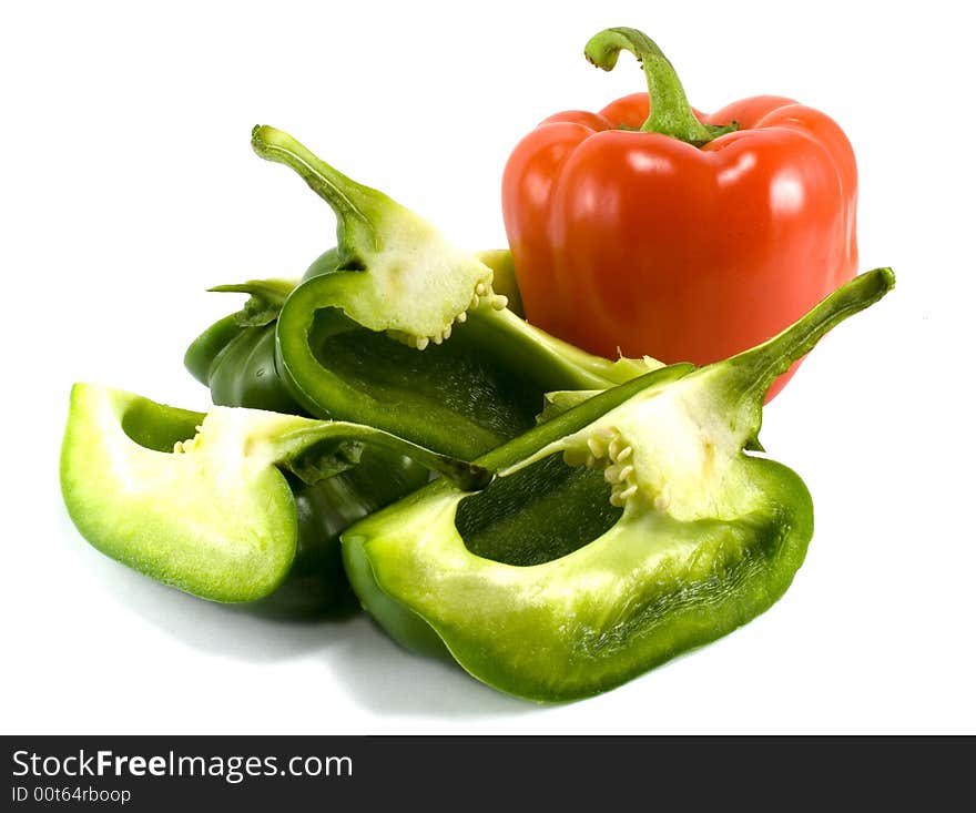 Red and green peppers isolated on white