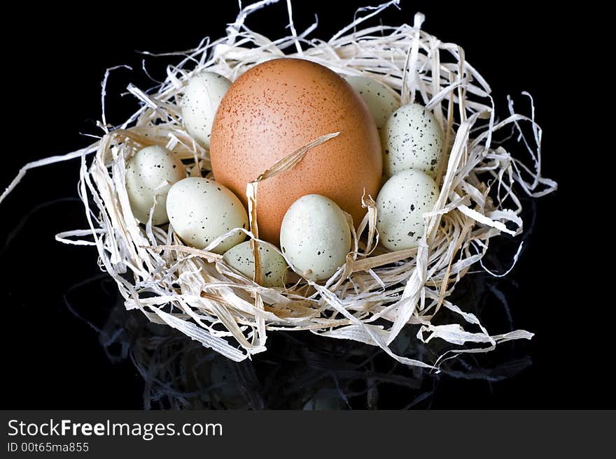 Close up of some Easter eggs on the nest