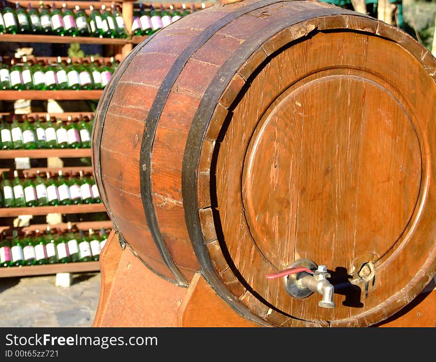 Wine cask with interesting pump for to make wine and flagons