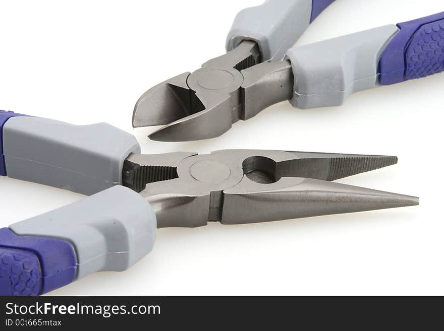 Blue gray handle cutters and needle nose pliers. Blue gray handle cutters and needle nose pliers