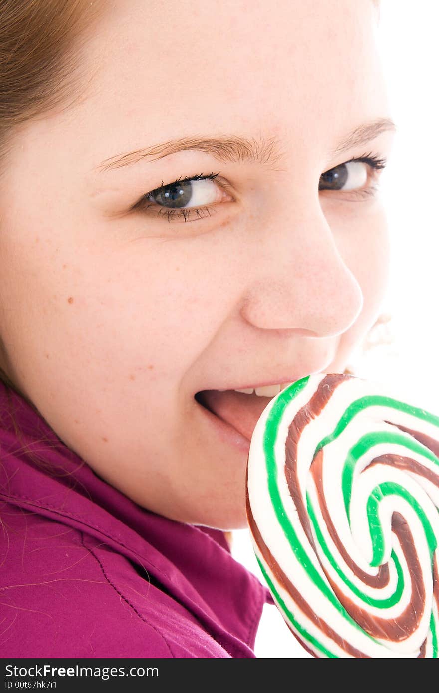 The Girl With A Sugar Candy Isolated On A White