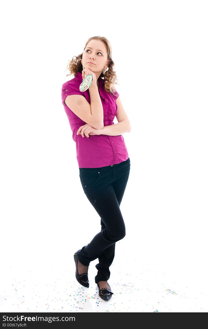 The girl with a sugar candy isolated on a white background