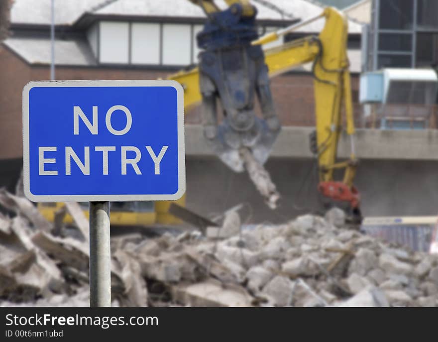 No entry sign with an industrial scene in the background. No entry sign with an industrial scene in the background