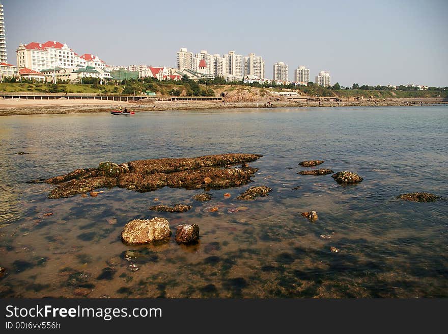 Coast near the city,which contains a lot of rocks